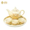 ảnh Bộ ấm trà thờ 3 chén men ngọc trai vẽ vàng 24K từ phía trên