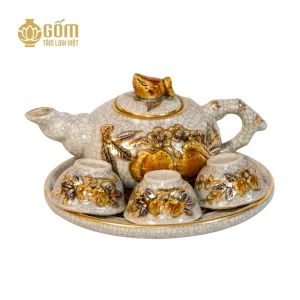 Hình ảnh Bộ ấm trà thờ 3 chén men rạn vẽ vàng họa tiết đào đắp nổi